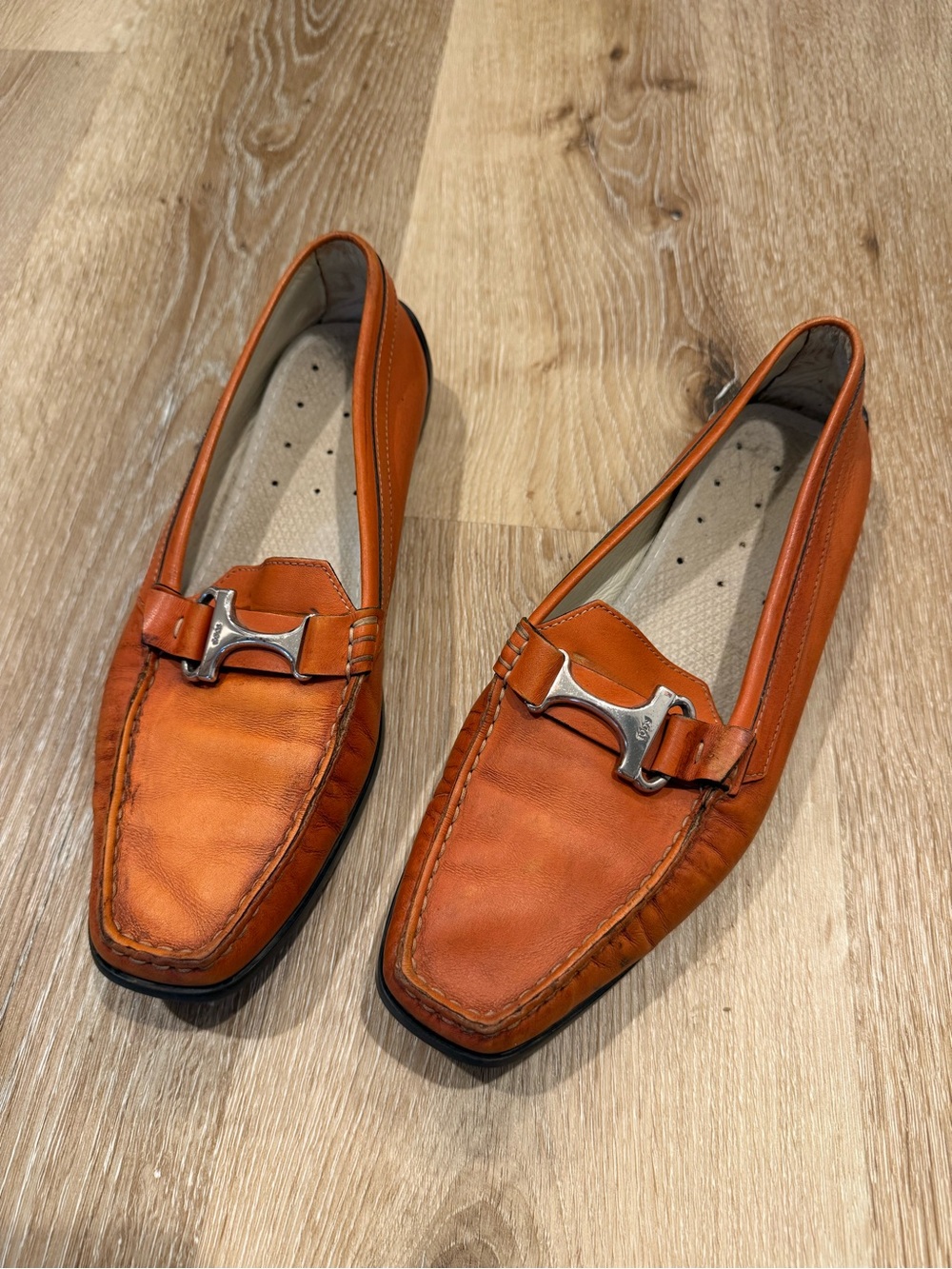 Tod’s women’s brown/burnt orange  Leather Loafers with Silver detail size 38.5